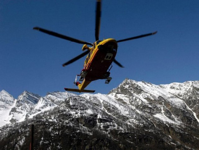Five killed as helicopter and small plane collide above Italian Alps