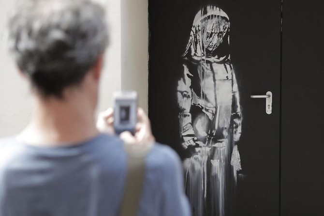 Banksy work stolen from Paris terror attack venue