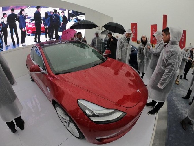 Tesla rolls out Model 3 in China ahead of schedule in sales push