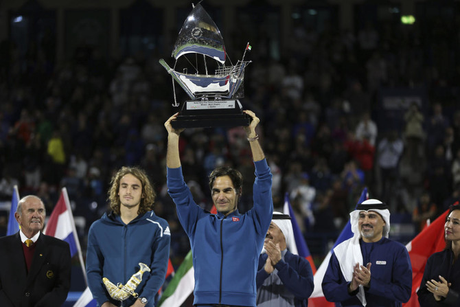 ‘Fortunate’ Roger Federer shows no signs of slowing after 100th title in Dubai