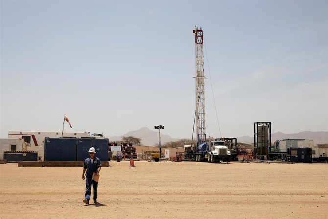 Oil firms as Saudis trim exports, US output forecast reduced