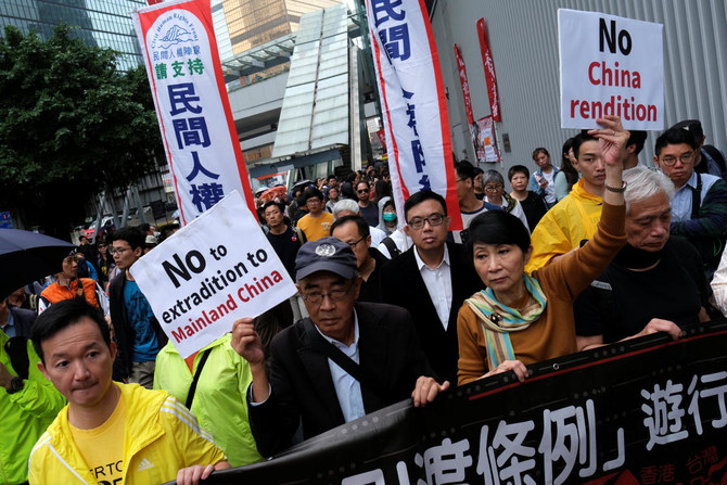 Thousands march in Hong Kong over proposed extradition law changes