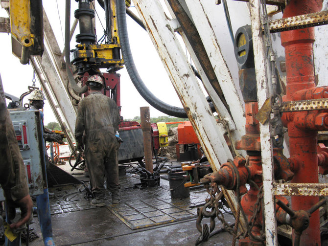 Oil prices slip on economic worries, surging US crude supply
