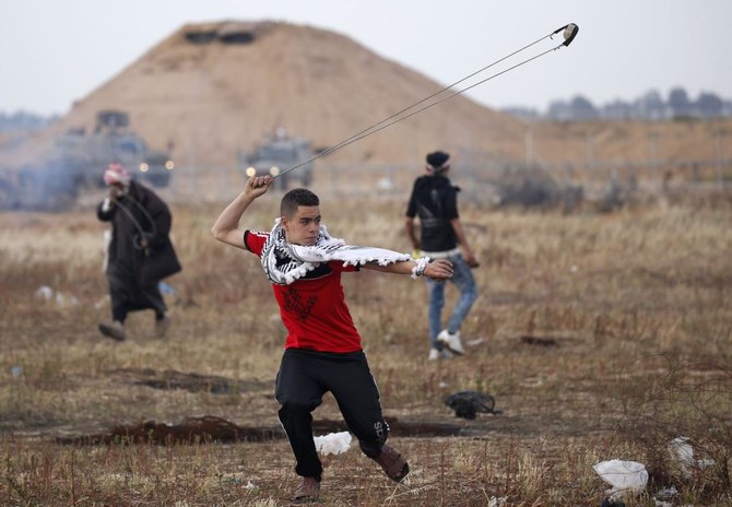 60 Palestinians hurt in Gaza border clashes