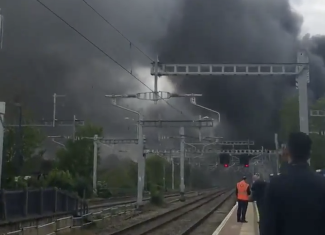 Huge fire breaks out near London’s Heathrow Airport causing rail delays