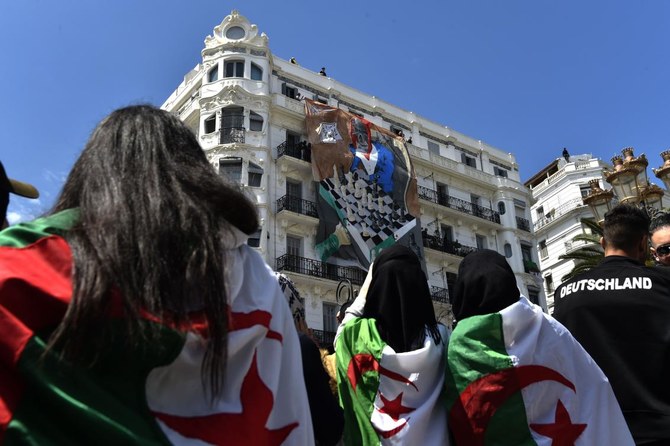 Algeria’s ruling party names relatively young new leader amid protests