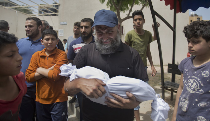  Israel agrees cease-fire with Gaza as Palestinians begin Ramadan burying their dead