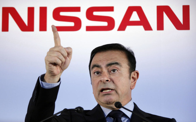 Nissan full-year net profit more than halves to near-decade low