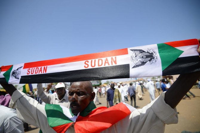 Sudan protesters tear down roadblocks, want army to resume talks