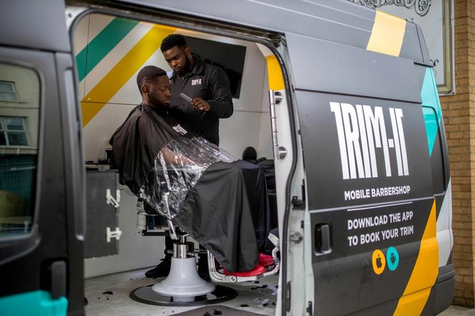 Mobile barber cuts a dash with Afro-Caribbean Londoners