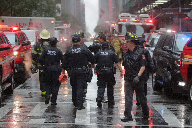 One dead after helicopter crash lands on top of Manhattan building