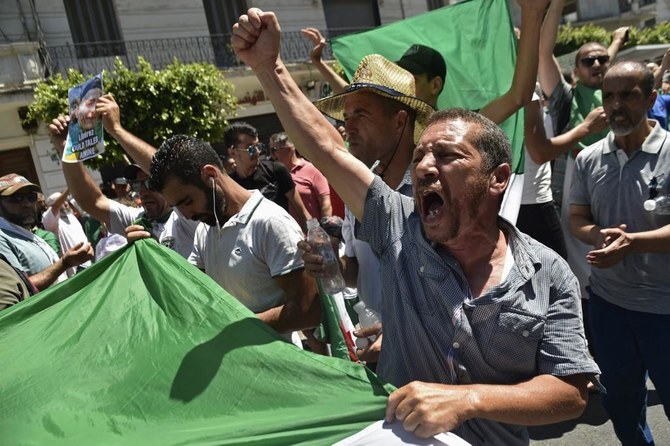 Thousands protest in Algeria capital, break police cordon