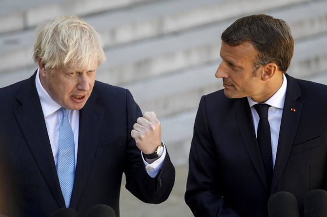 Britain’s Johnson asks France’s Macron to ‘push forward’ on Brexit