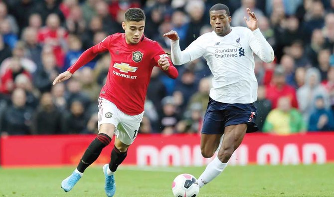 Manchester United end Liverpool’s winning run in 1-1 draw