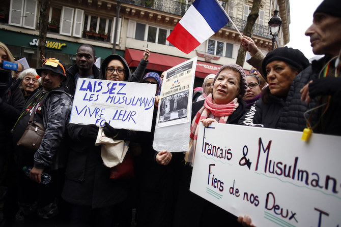Thousands march in Paris against Islamophobia after attack