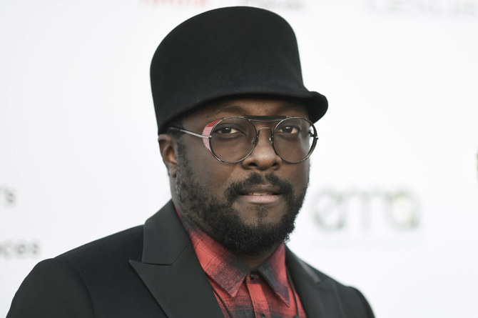 Qantas urges rapper will.i.am to withdraw racism accusation against staffer