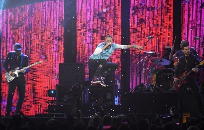 Environmentally conscious Coldplay says it won’t tour new album, ahead of Jordan gigs