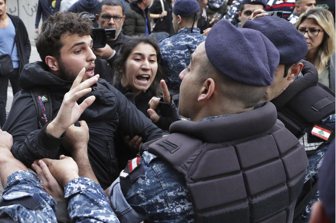 Lebanon protesters defiant despite Hezbollah attack
