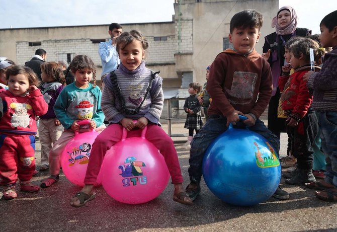 Displaced Syrians start new year in abandoned prison
