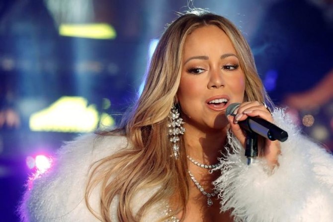 Mariah Carey first to score #1 hit in four different decades