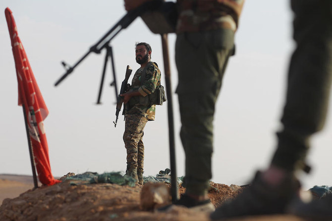 Unidentified planes hit Iraqi militiamen in Syria, killing 8