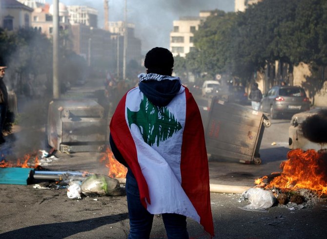 Lebanese block roads as protests enter fourth month