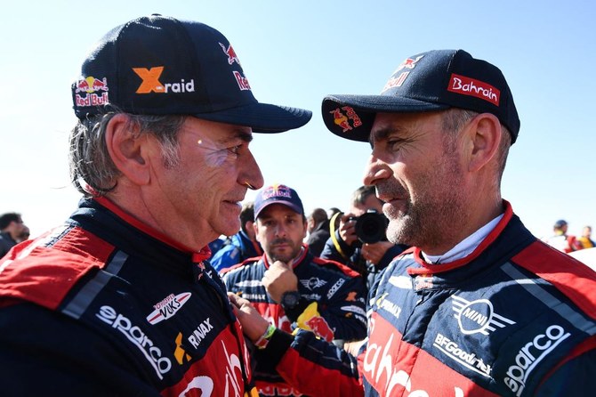 Spanish driver Carlos Sainz takes third Dakar Rally title after winning Saudi edition 
