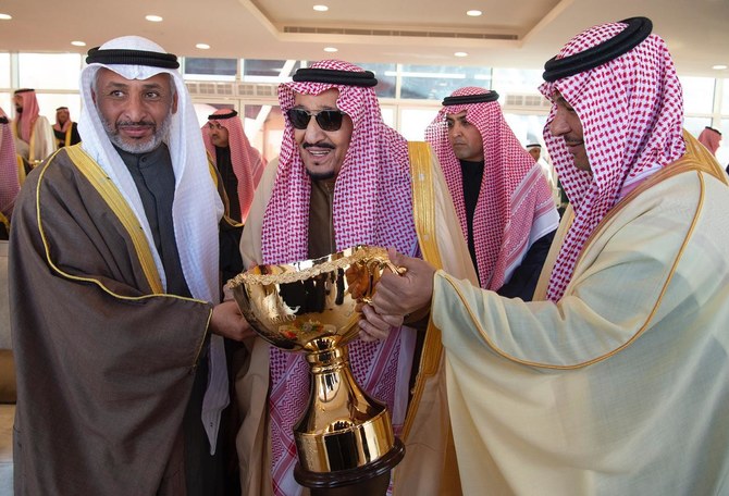 King Salman awards race and beauty contest winners during King Abdulaziz Camel Festival finale