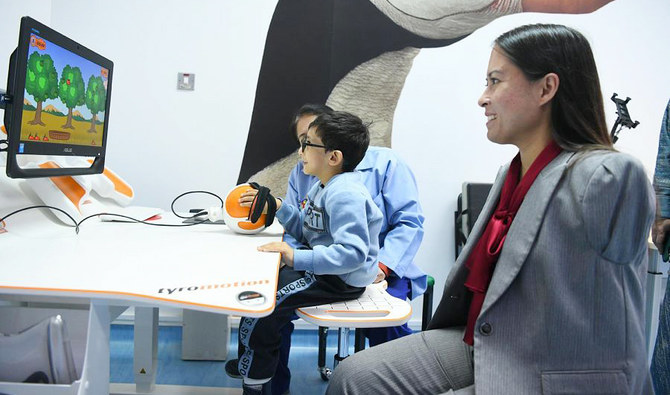 First armless pilot visits disabled children’s center in Riyadh