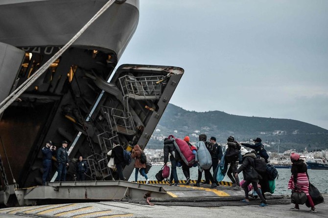 Greek navy ship on Lesbos houses latest island migrants