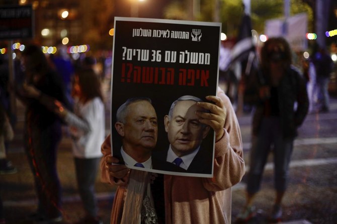 Thousands protest Israel coalition deal on eve of court date