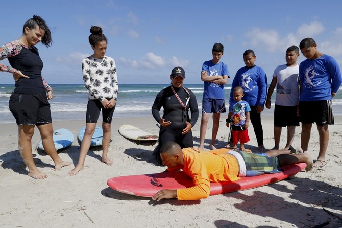 Arab Israeli surfer keeps hopes alive at last Arab village on Israel’s Mediterranean coast