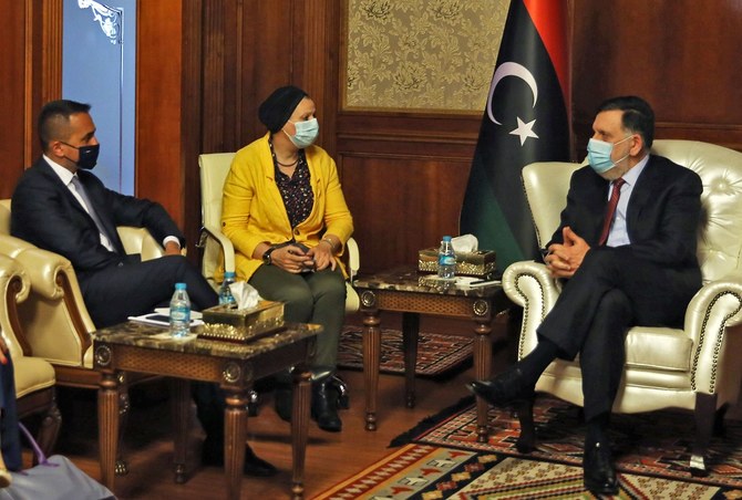 Italy’s foreign minister pays quick trip to Libya