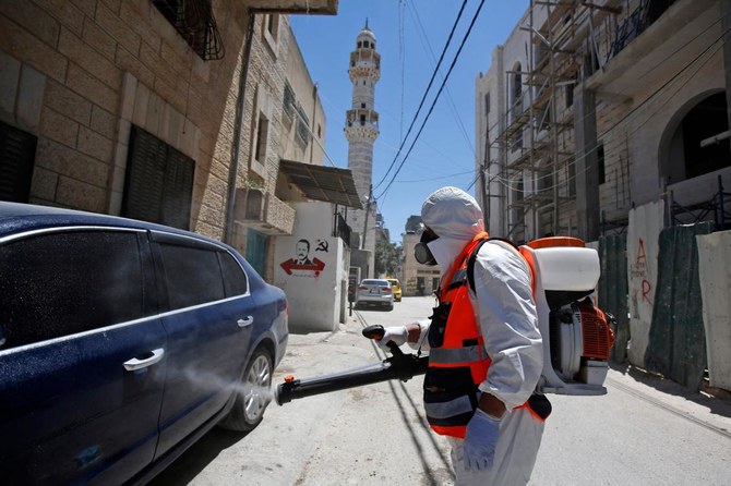 Palestinians close Bethlehem after virus spike