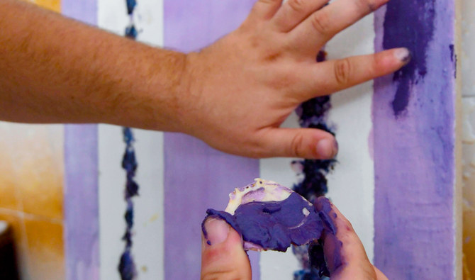 Passion for purple revives ancient dye in Tunisia