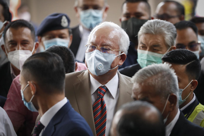 Malaysian ex-PM gets 12 years jail in 1MDB corruption trial