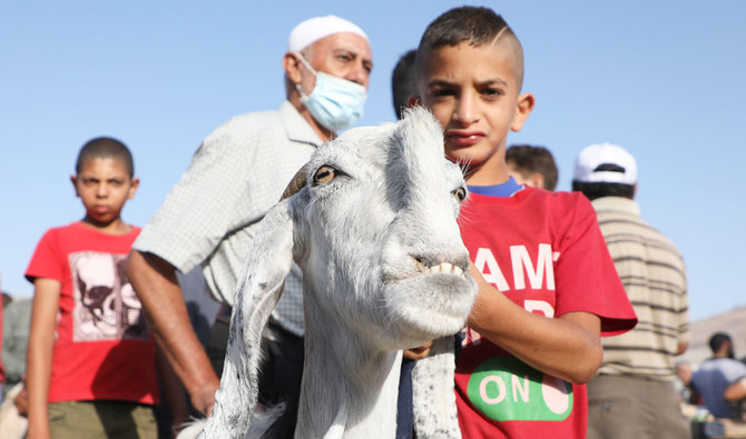 In West Bank, Eid sacrifices plummet as virus cases soar 