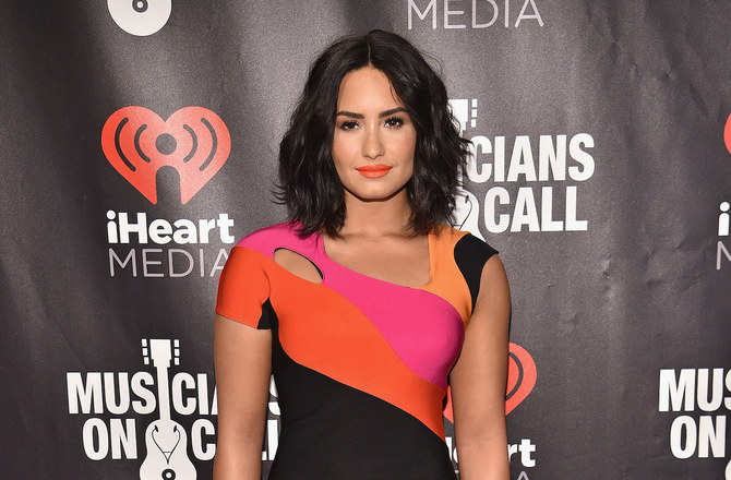 Demi Lovato steps out in Jordanian-Romanian designer after engagement
