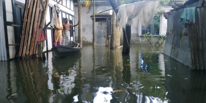 Thousands struggle to stay afloat as Bangladesh floods wreak havoc