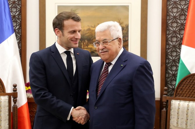 Middle East peace talks remain priority, Macron says after call with Abbas
