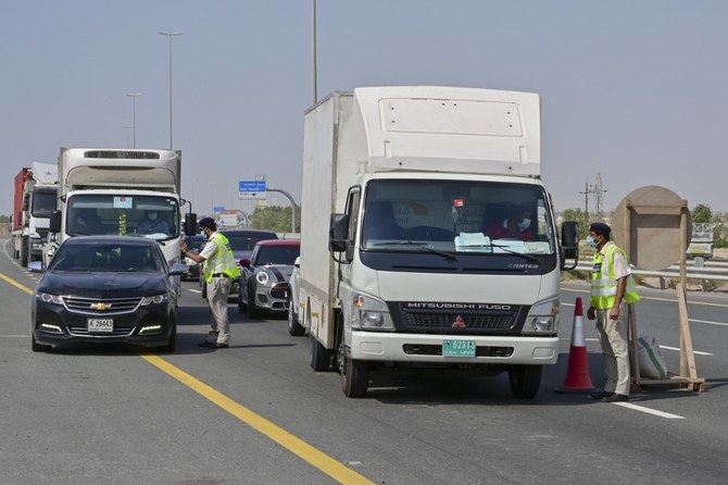 Abu Dhabi introduces new COVID-19 tests as it tightens border crossing rules