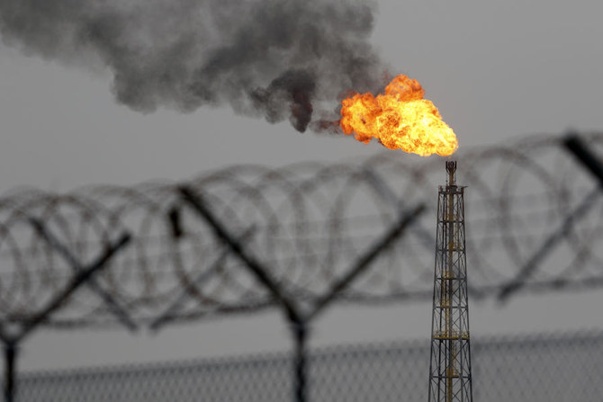 With a battered economy, Iraq debates its contribution to OPEC+ oil cuts