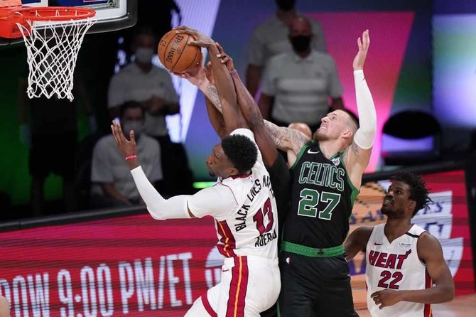 Celtics rally to beat Heat, stay alive in NBA playoffs