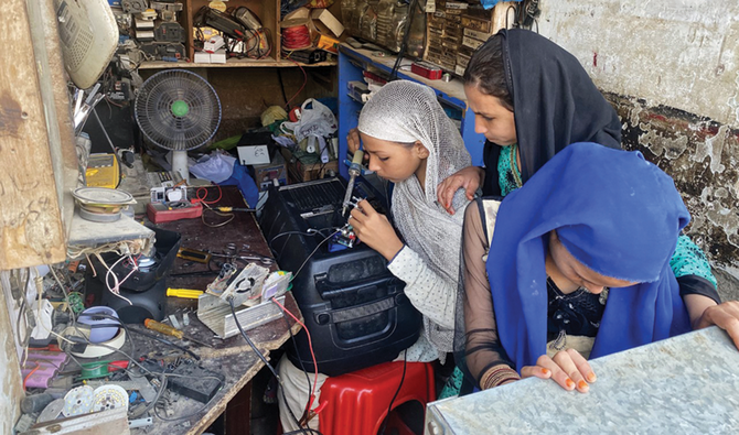 Power of good: Pakistani father trains daughters to be electricians in Karachi