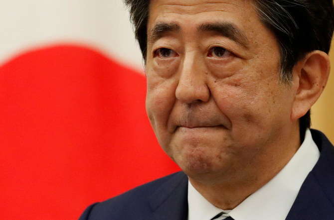 Japan prosecutors seek to question ex-PM Shinzo Abe on spending scandal