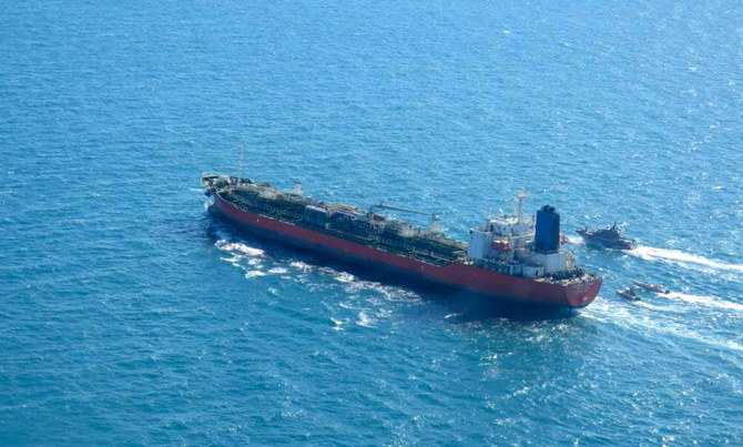 A picture obtained by AFP from the Iranian news agency Tasnim on January 4, 2021, shows the South Korean-flagged tanker being escorted by Iran's Revolutionary Guards navy after being seized in the Gulf. (AFP/File Photo)