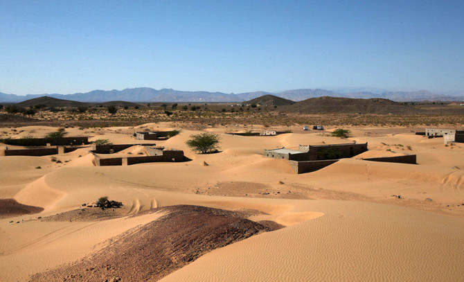 Omanis revive memory of village swallowed by desert