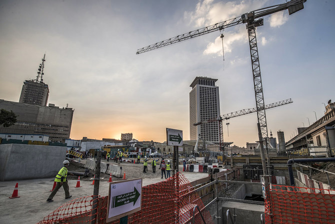 This picture taken on November 22, 2020 shows a view of ongoing construction work at the Maspero station of the Cairo Metro's third line during the visit of France's Transport Minister, while seen in the background are the Foreign Ministry headquarters (R) and the main Maspero Radio and Television Broadcasting building (L). (AFP/File Photo)