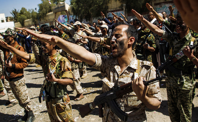 Newly recruited Houthi fighters chant slogans during a gathering in the capital Sanaa to mobilize more fighters to battlefronts to fight pro-government forces in several Yemeni cities. (AFP/File Photo)