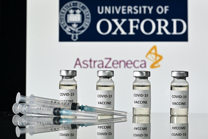 This file illustration photo shows vials with COVID-19 Vaccine stickers attached and syringes, with the logo of the University of Oxford and its partner British pharmaceutical company AstraZeneca. (File/AFP)